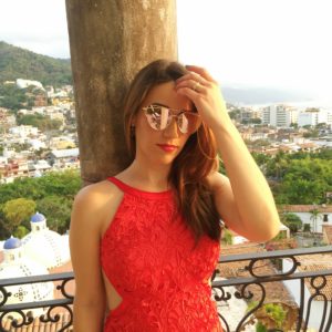 chic woman in red dress and sunglasses