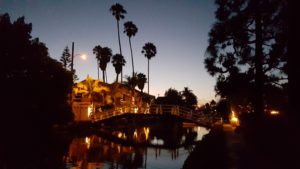 watch the sun set at the venice beach canals