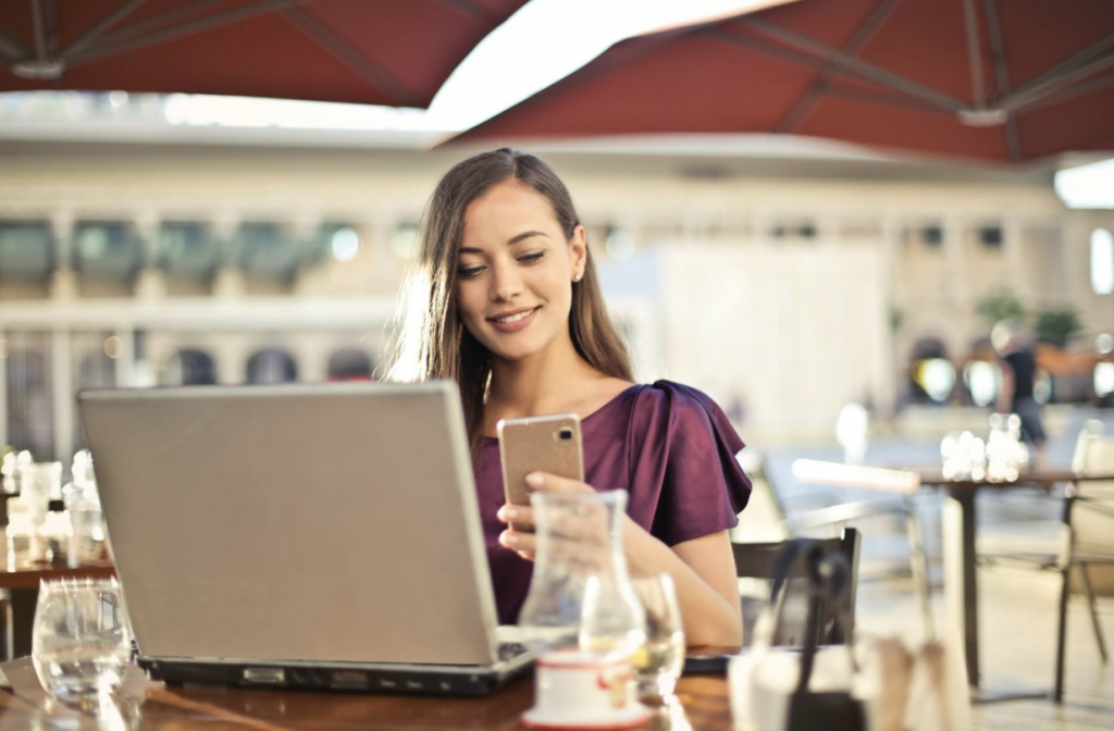 woman-working-at-computer-happy